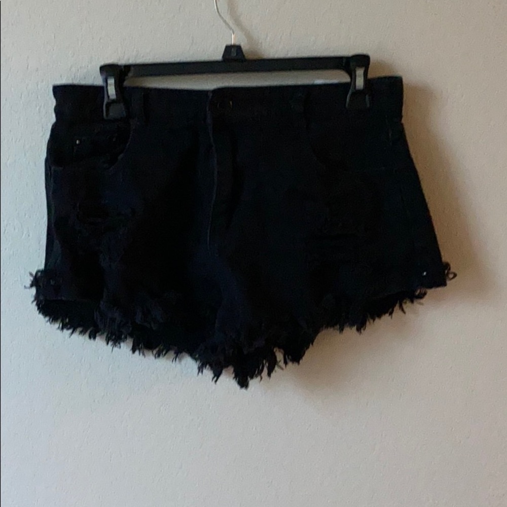Distressed black denim shorts
